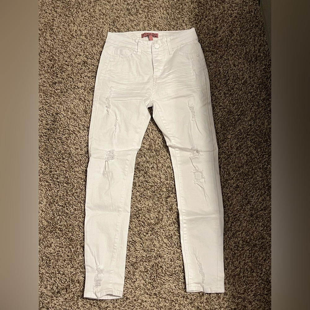 White ripped skinny jeans.